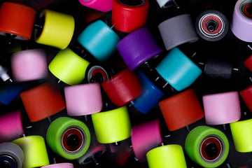 Colorful Heelys wheels arranged in a pattern